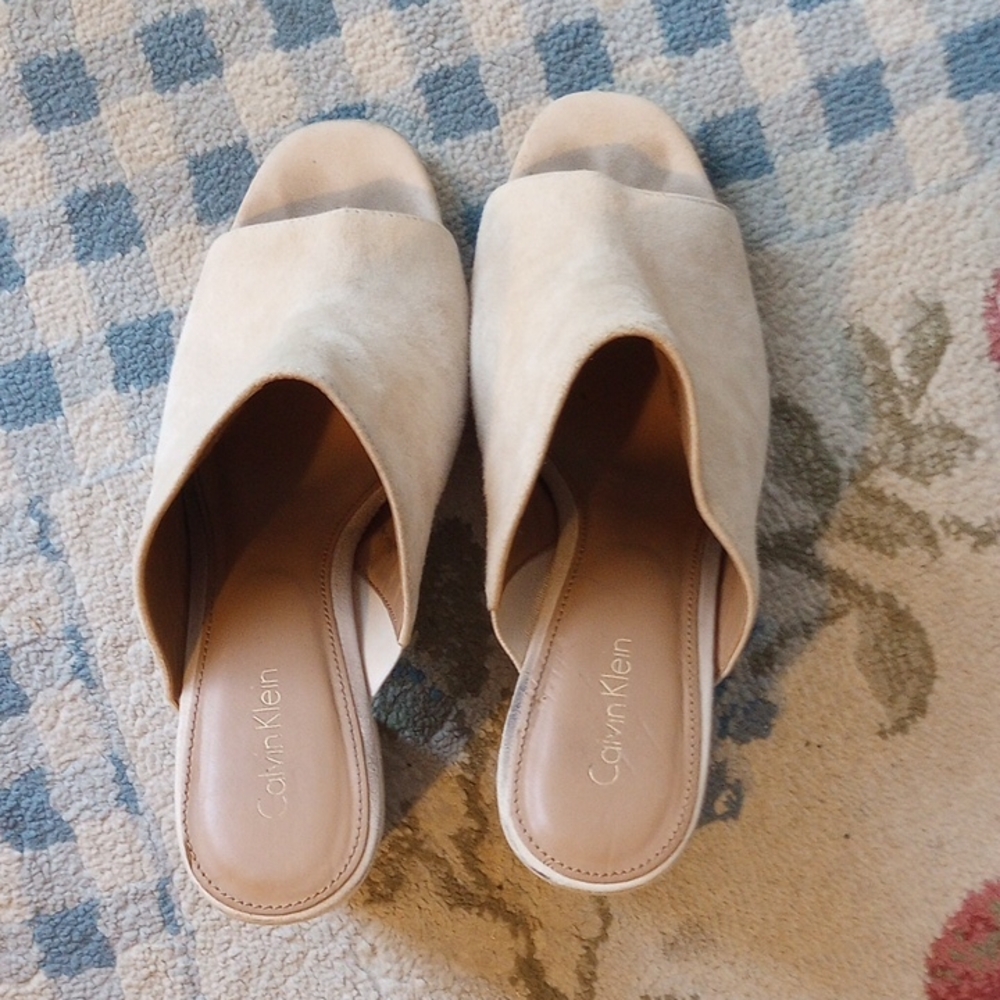 Calvin Klein Cream Mules Elegant and Versatile